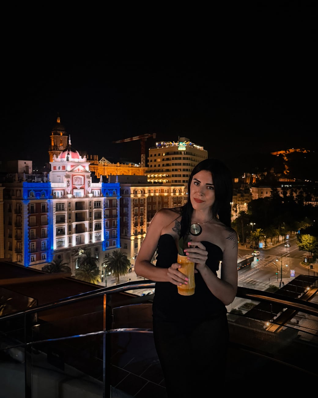 Svetlana on a rooftop terrace in Spain at night